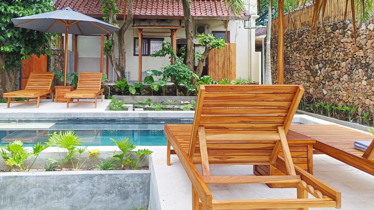 Отель Dalai Tropical Kuta  Экстерьер фото