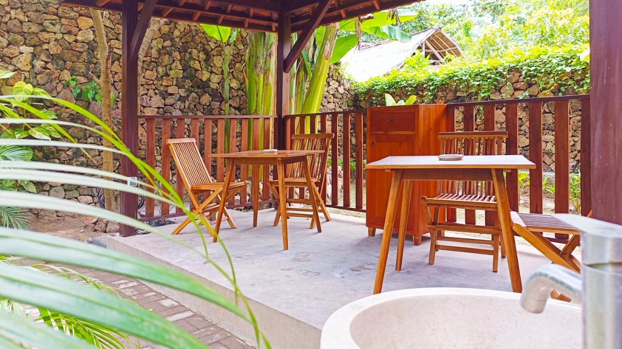 Отель Dalai Tropical Kuta  Экстерьер фото