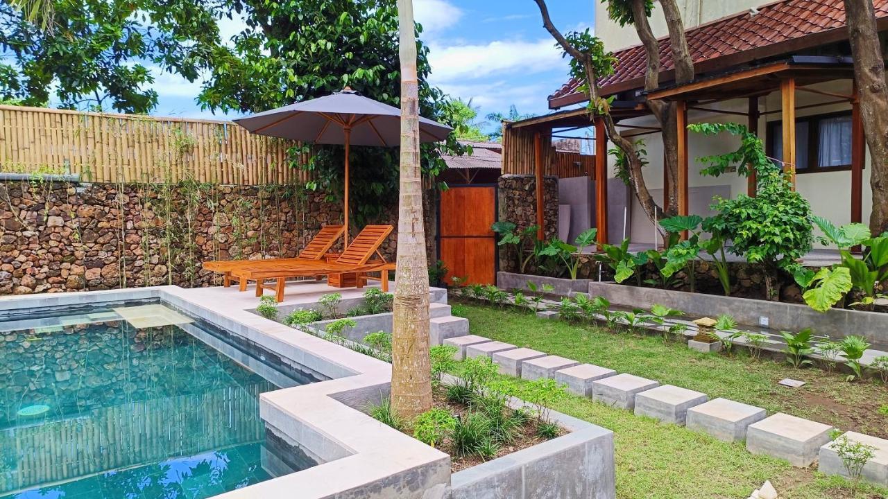 Отель Dalai Tropical Kuta  Экстерьер фото